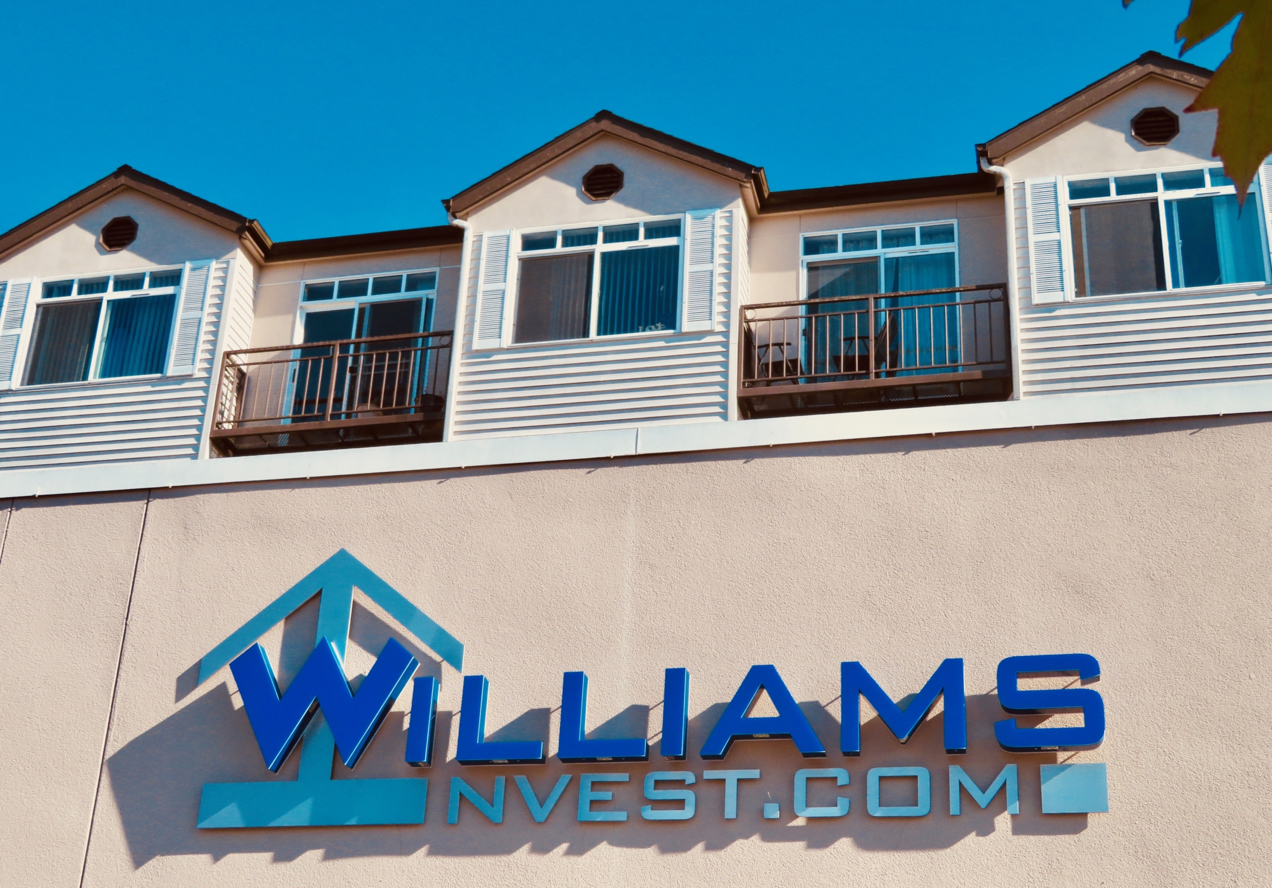 Williams Investments sign at office building