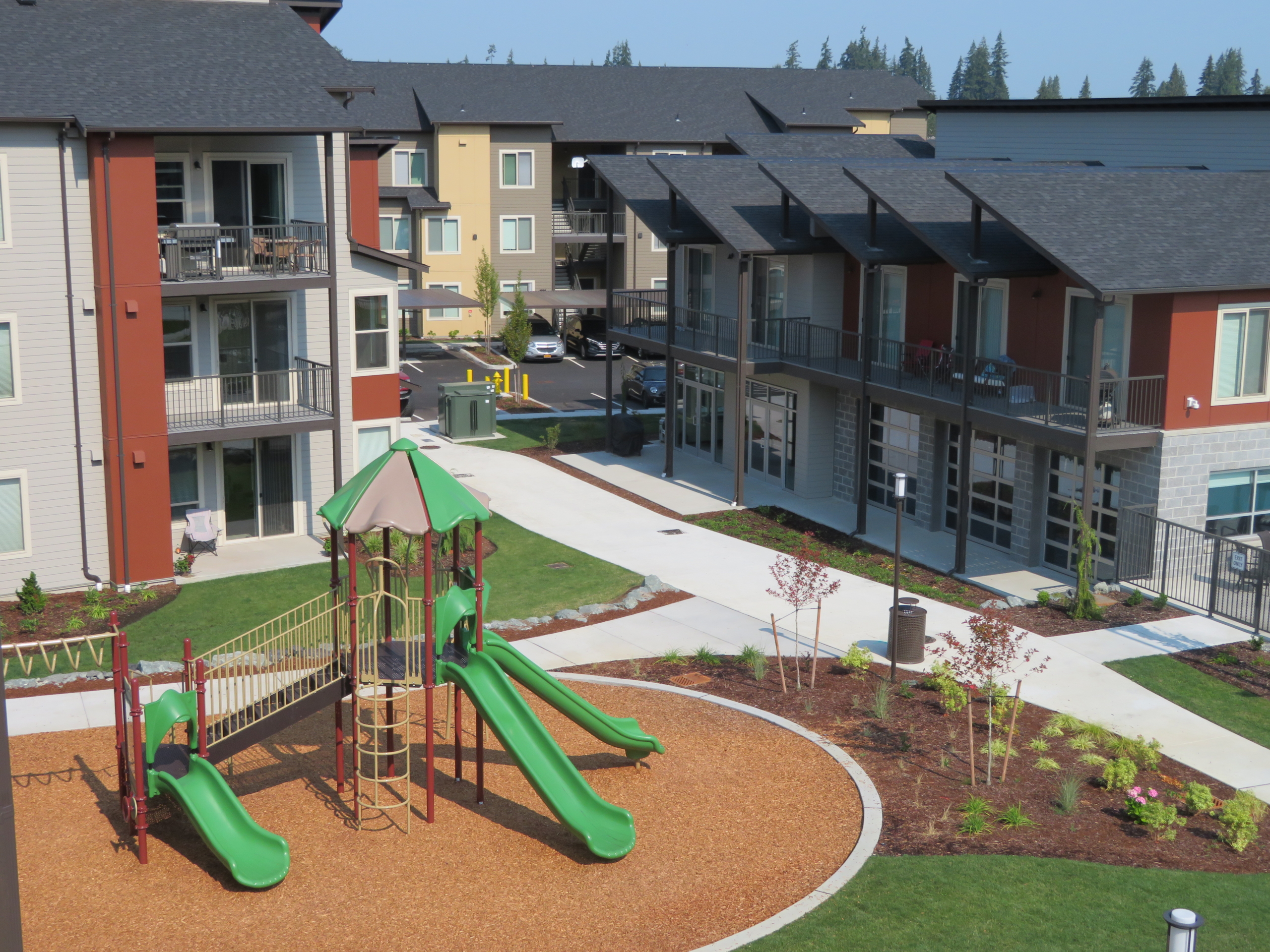 Aerial view of playground and apartment buildings