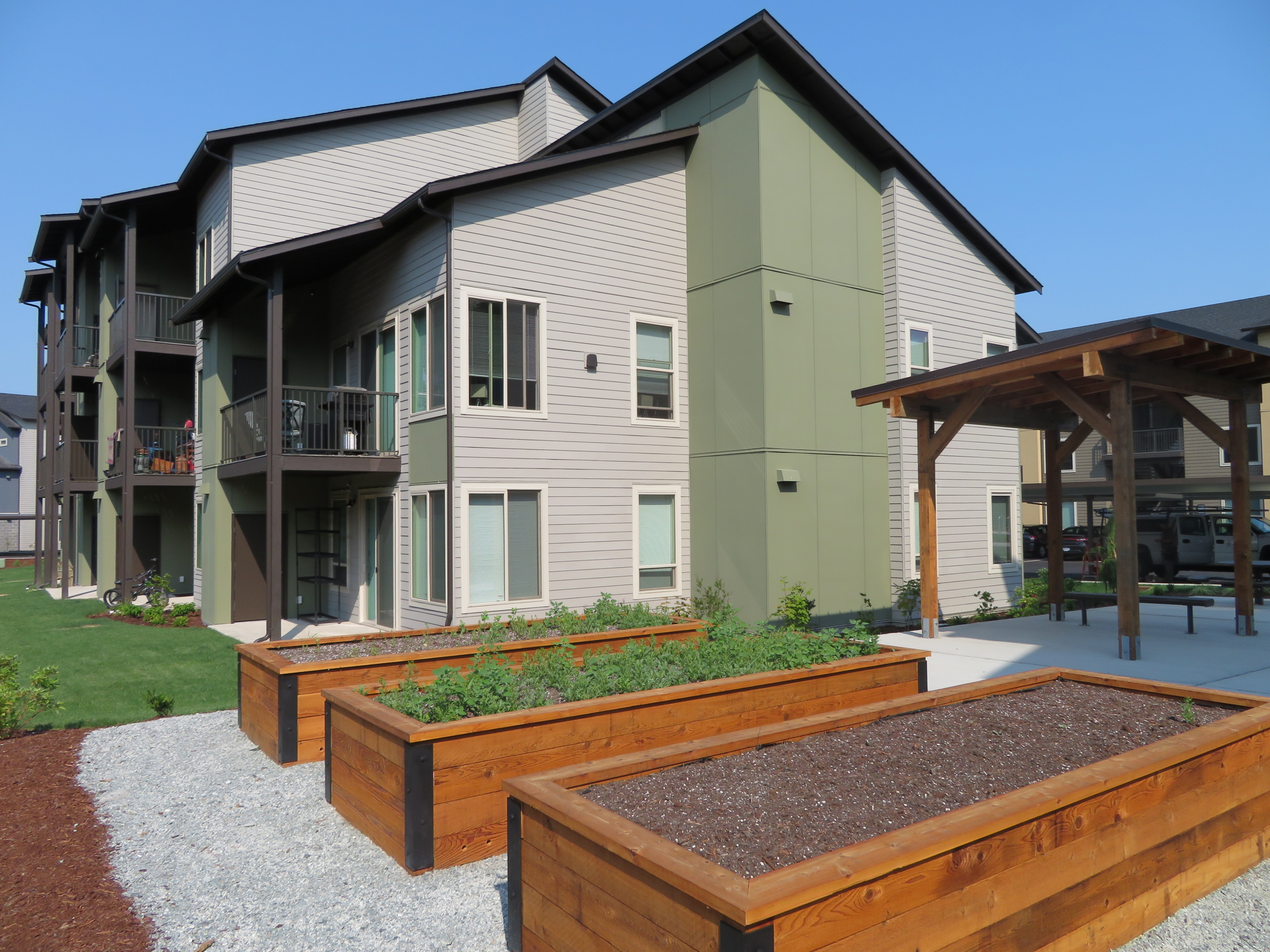 garden beds and apartment building