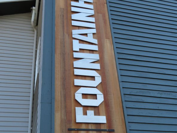 Fountainhead apartments sign on building