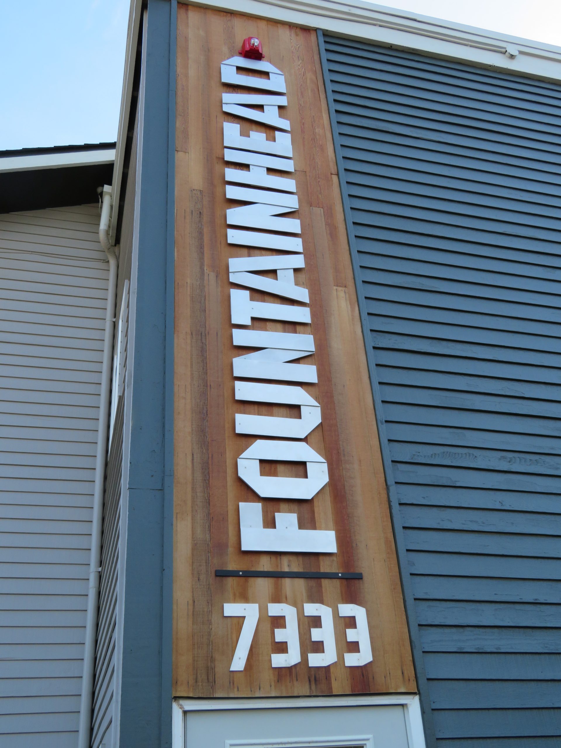 Fountainhead apartments sign on building