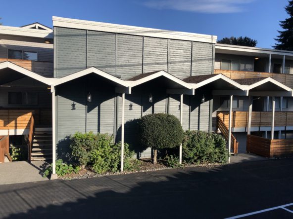 Parking lot view of Fountainhead apartments in Everett, WA