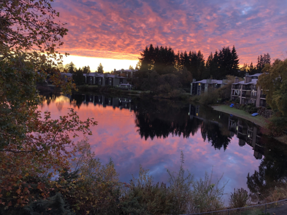 Sunset on lake at shoreside village apartments